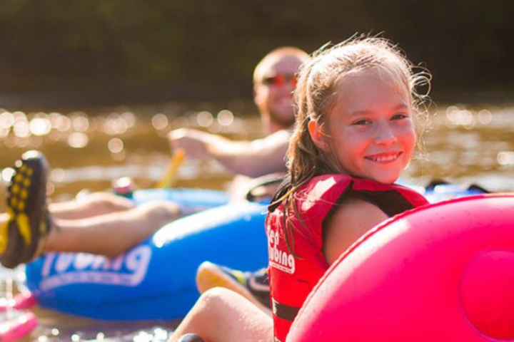 a little girl playing with a frisbee