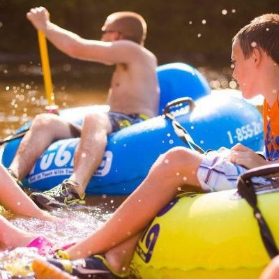 a woman sitting on a raft