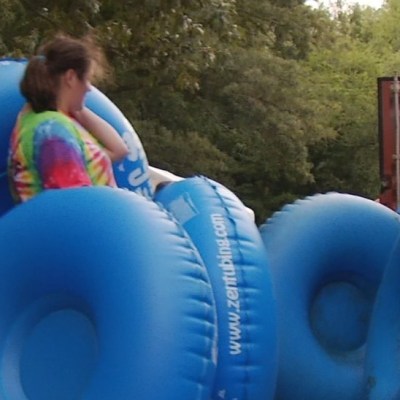 a group of people around each other