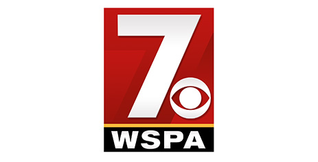 Red rectangle with a large white '7' and CBS logo above 'WSPA' in black on a yellow line.